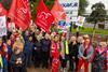 Workers on strike holding signs outside Bakkavor Spalding strike action