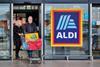 2025 Aldi store customers sign
