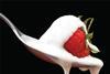 Cream on strawberry