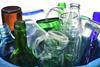 Glass drink bottle in waste