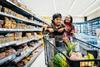 gen alpha child family supermarket shopper aisle bread