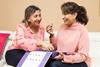 Women sharing Cadbury Milk Tray