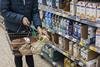 Purchasing Lactose Free Milk - stock photo