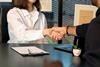 office handshake unsplash