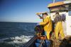 fisherman on a boat - getty