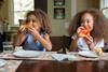 Children eating pizza