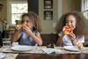 Children eating pizza
