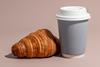 croissant and takeout coffee