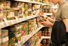 shopper supermarket aisle ambient olive GettyImages-1017200420
