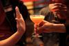 hand refusing alcohol
