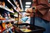 woman filling shopping basket