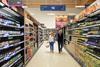 tesco shoppers in alcohol aisle