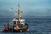 Commercial Fishing Trawler On The Calm Water Of The Atlantic Ocean In Scotland, UK - stock photo - Getty Images