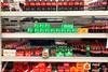 soft drinks coke sprite shelves aisle