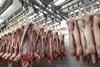 Meat hanging in abattoir