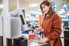 supermarket shopper selfcheckout scan as you shop pay till tesco