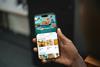 Free Hand Holding iPhone 16 Pro Mockup