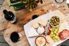 cheese and wine olives grapes cheeseboard