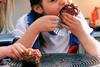children eating cake sugar fast food junk GettyImages-1309252650
