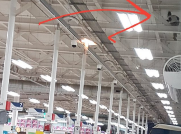 Tesco store evacuated as security guard protests on roof | News | The ...