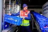 Tesco delivery driver worker with body camera
