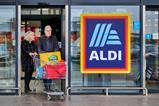 2025 Aldi store customers sign
