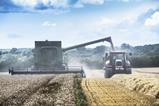comvbine harvestor and tractor - getty