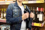 shoplifting stealing steal wine alcohol crime