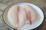 white fish on plate - getty