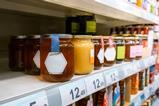 honey bottles supermarket shelf