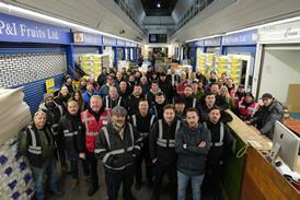 Wholesalers congregate for a final portrait in the original Buyers' Walk at New Covent Garden Market - NCGM
