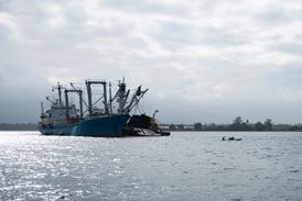 Tuna fishing trawlers near Madang, Papua New Guinea - stock photo