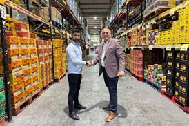 Enzo Wholesale MD Umit Aydemir (pictured left) with Unitas member development controller Stephen Cheetham