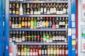 supermarket wine alcohol aisle shelf GettyImages-1305261341