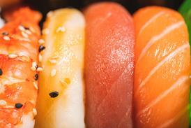 Nigiri sushi close up in a take away box - stock photo