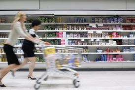 running shopper supermarket trolley aisle