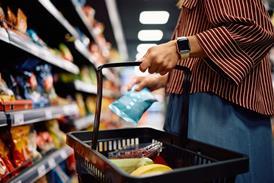woman filling shopping basket