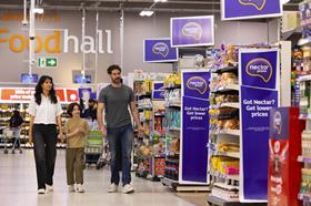 Family shopping in Sainsburys 2