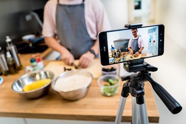 Social media influencer filming GettyImages-2160980929