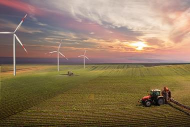 eco sustainability wind power farming farm tractor GettyImages-1370265820