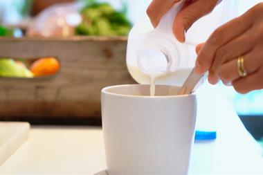 milk in cup - getty