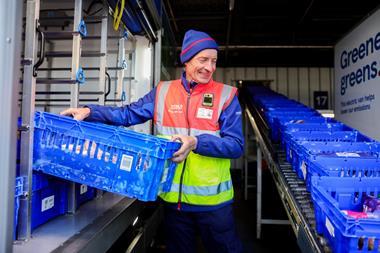 Tesco delivery driver worker with body camera