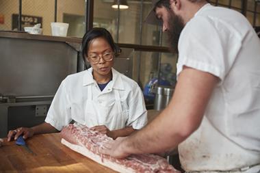 Female butcher meat worker