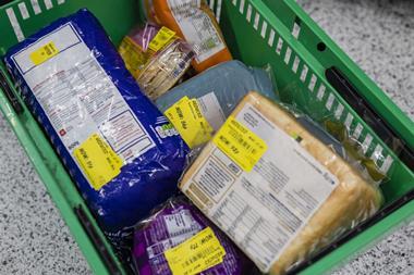 supermarket asda basket discount reduced price bread GettyImages-1371981345