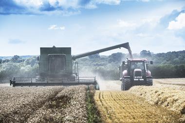 comvbine harvestor and tractor - getty