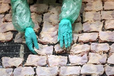 poultry facing backlash from green campaigners, raw chicken in factory