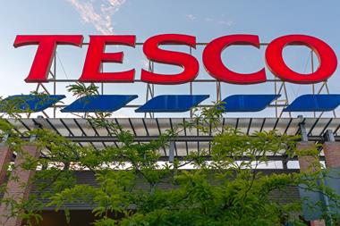 tesco store sign tree GettyImages-1426886264