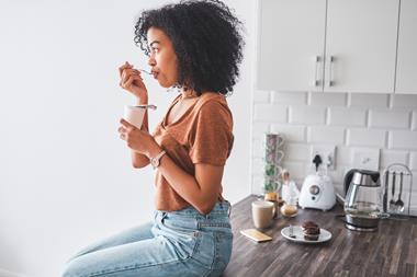 Girl eating yoghurt resized