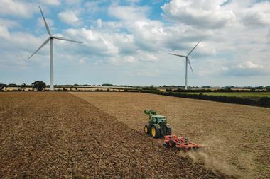 field farming tractor wind turbines