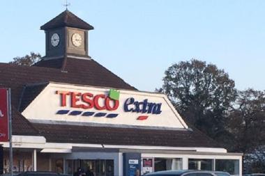 Tesco sign with Christmas hat